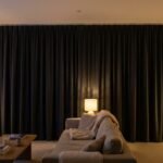Custom blackout curtains fitted in a Dubai apartment living room