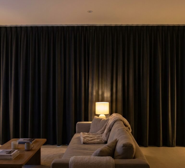 Custom blackout curtains fitted in a Dubai apartment living room
