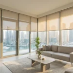 Light-filtering roller blinds in a modern Dubai Marina apartment living room